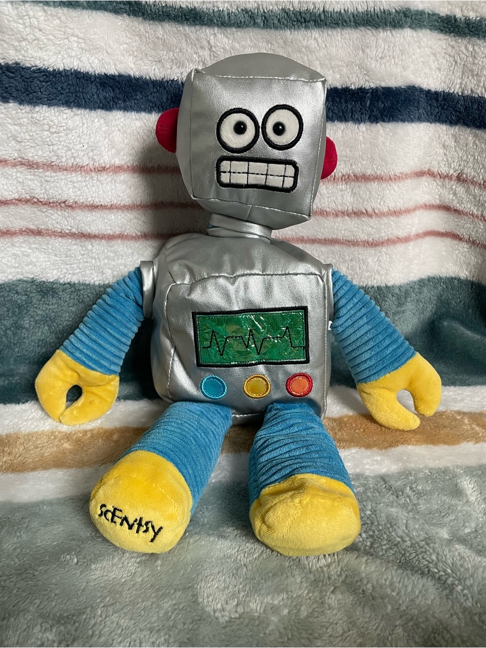Scentsy Silver Robot Plush with Blue Arms and Yellow Hands
